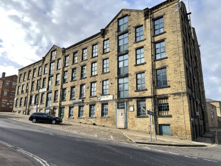 The property briefly comprises a substantial former warehouse of stone construction under a dual-pitched blue slate roof. The majority of the accommodation is split up over 5 storeys, circa. 5,600 Sq Ft per floor, along with small lower ground floor...