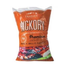 Bag of Traeger hickory wood pellets. Text on bag: 100% pure hardwood pellets. 100% food grade. Pair with Traeger Rubs / Traeger 'Que sauce.