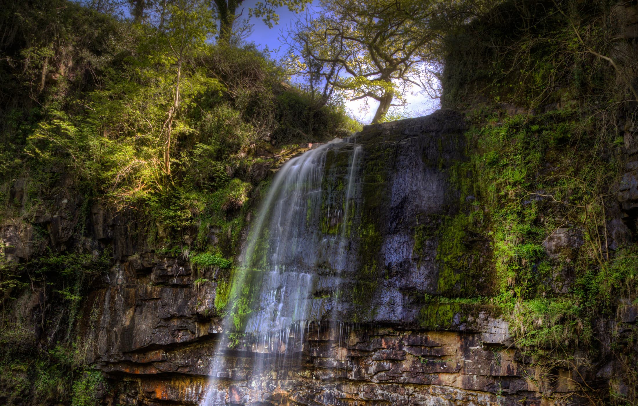 1. Henrhyd Falls, Wales accommodation - Beautiful camping and glamping site featured in HolidayFox article