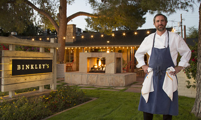 Kevin Binkley in front of his restaurant, Binkley