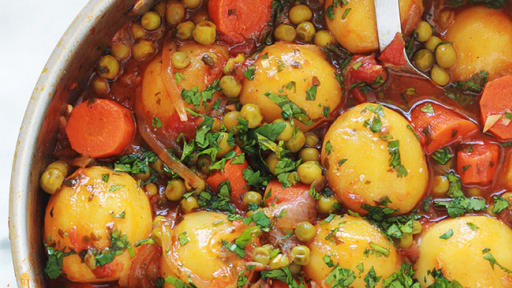Légumes mijotés en sauce tomate (petits pois,carottes ...