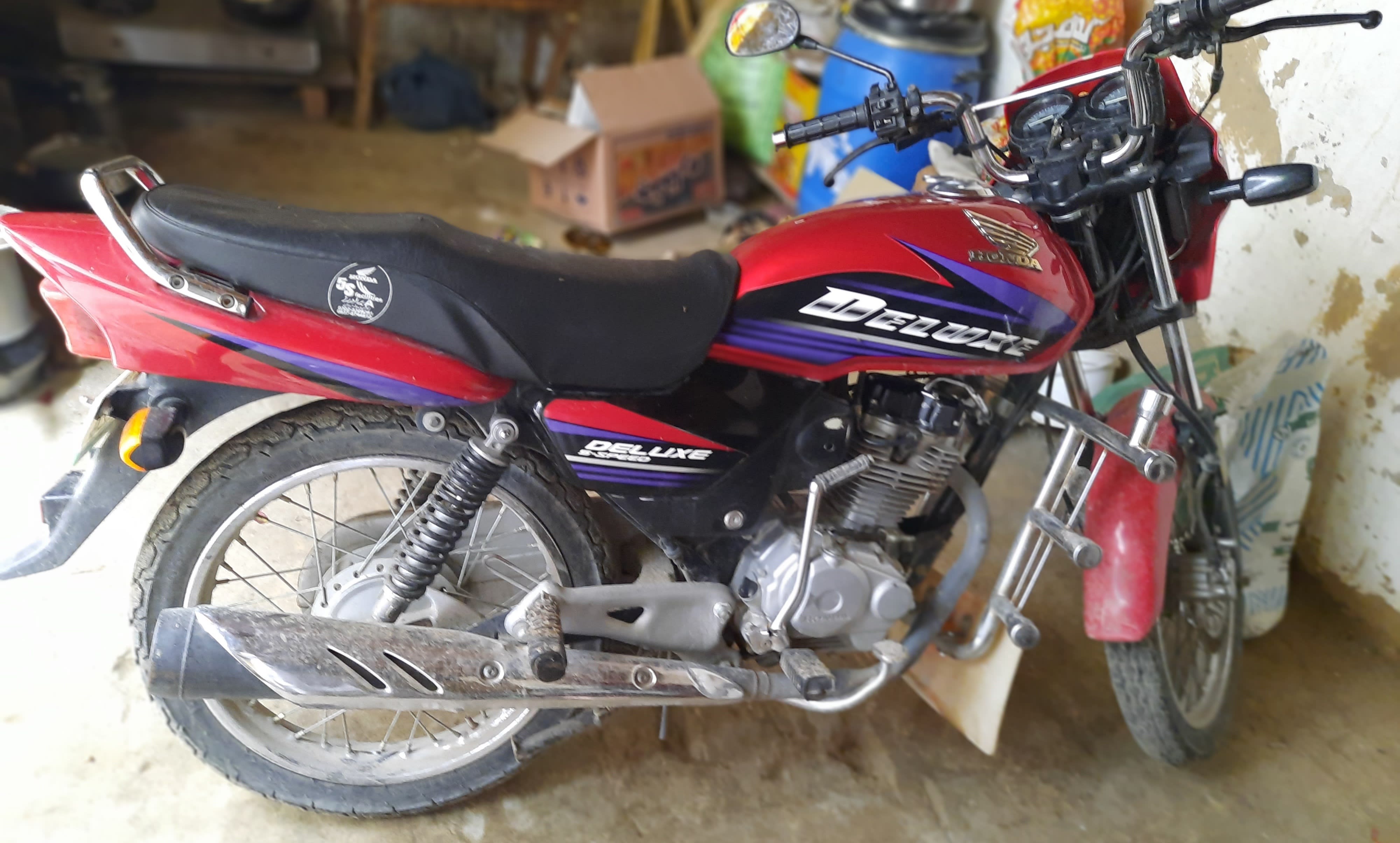Honda deluxe sales 125 olx