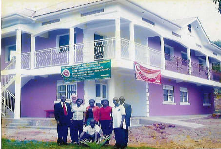 Anthony Zimba (1st left) during his visit to ESAU office in 2012 together with the late Augustine Mugarura and members of staff
