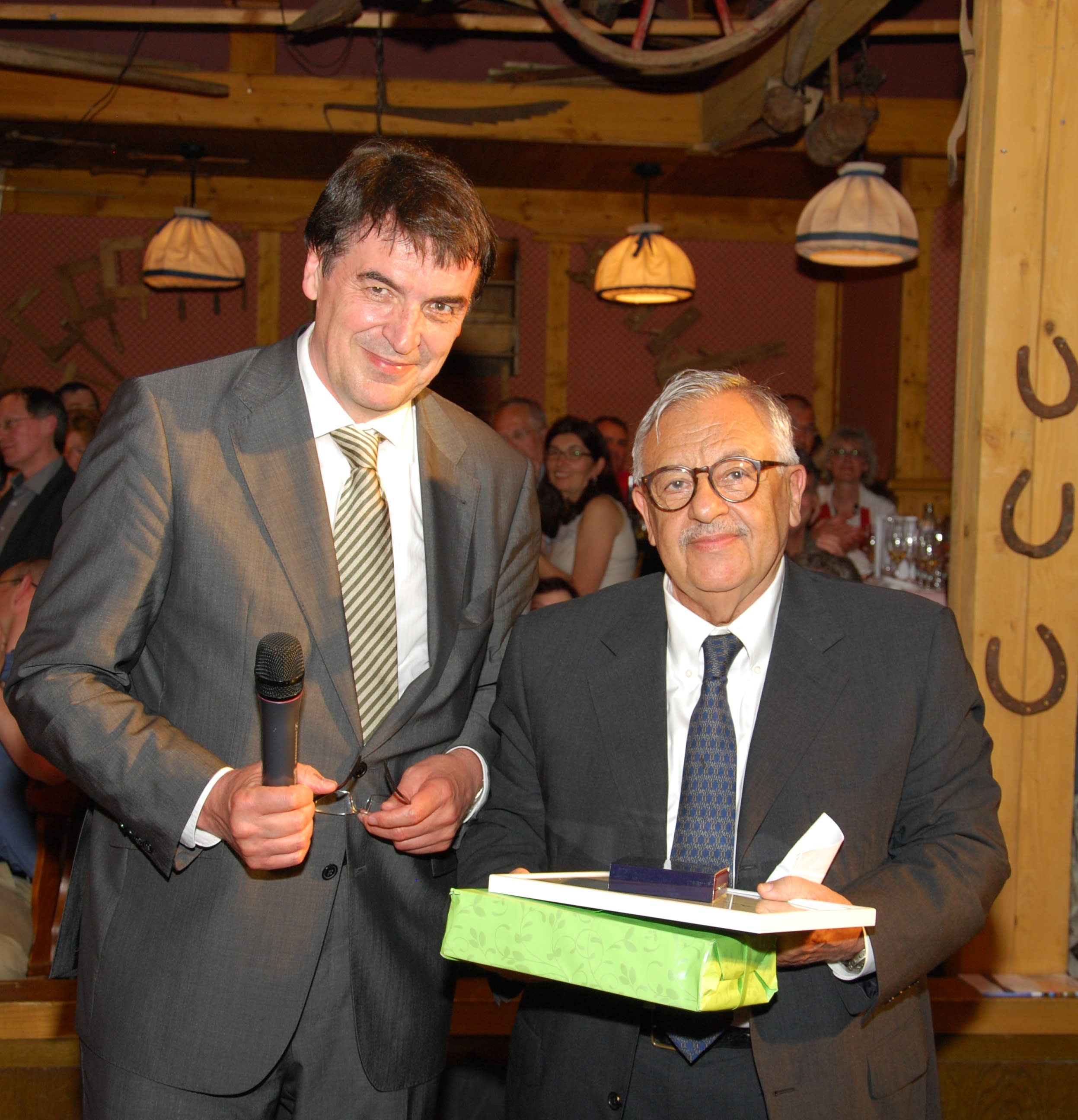 President Günter Krämer presenting the Tissot Medal of the Swiss League Against Epilepsy to Professor Giuseppe Scollo-Lavizzari, Basel, Switzerland