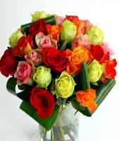 Round bouquet of different colored roses