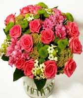 Round bouquet of pink roses and green chrysanthemums