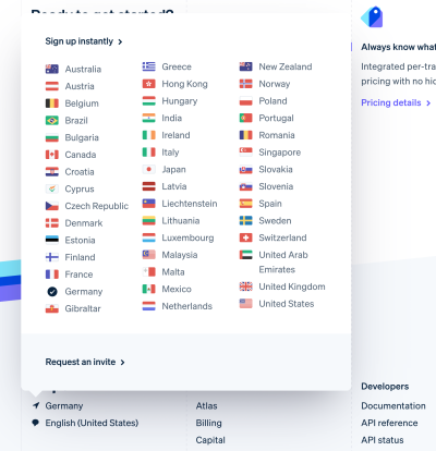 with a popover allowing users to jump to a different country in the footer.