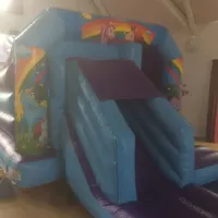 Unicorns Disco Bouncy Castle With Slide And Large Didi Car Racetrack