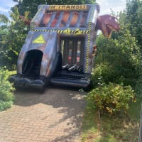 T Rex Bouncy Castle With Front Slide