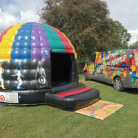 Disco Dome Inflatable With It's Funtime Van In A Garden In Bourne