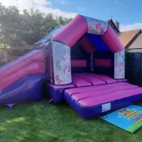 Unicorns Pink And Purple Disco Side Slide Combi Bouncy Castle