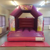 Pink And Purple Unicorn Ponies Themed Bouncy Castle