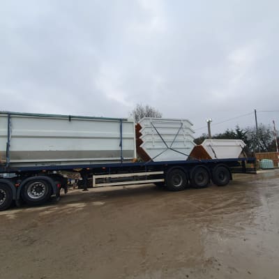 Huge Skip Hire Wagon With Many Skips