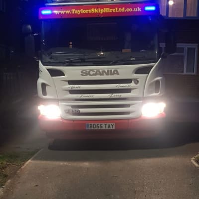 Lorry With Headlights At Night