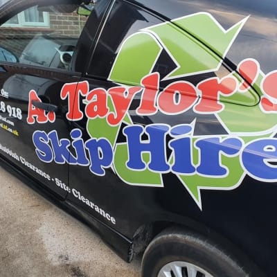 Taylors Skip Hire Car With Decal