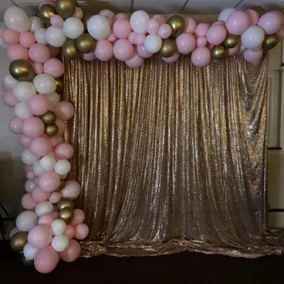 Gold Shimmer Curtain Backdrop And Balloon Arch For A Birthday Party In Gravesend By Deluxe Flower Walls
