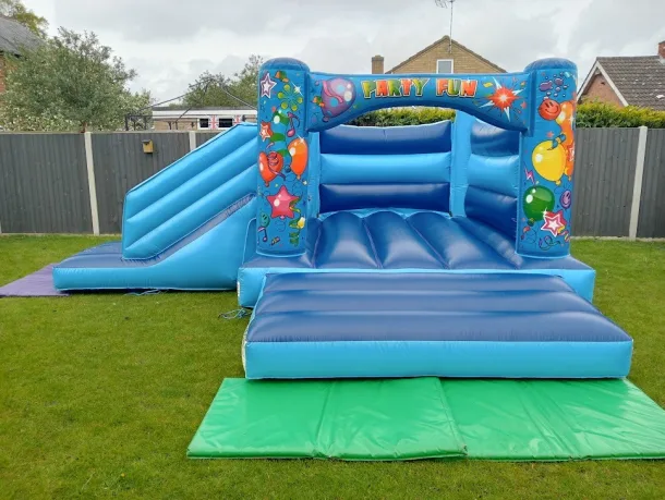 Blue Balloons Themed Bouncy Castle With Slide In Stamford