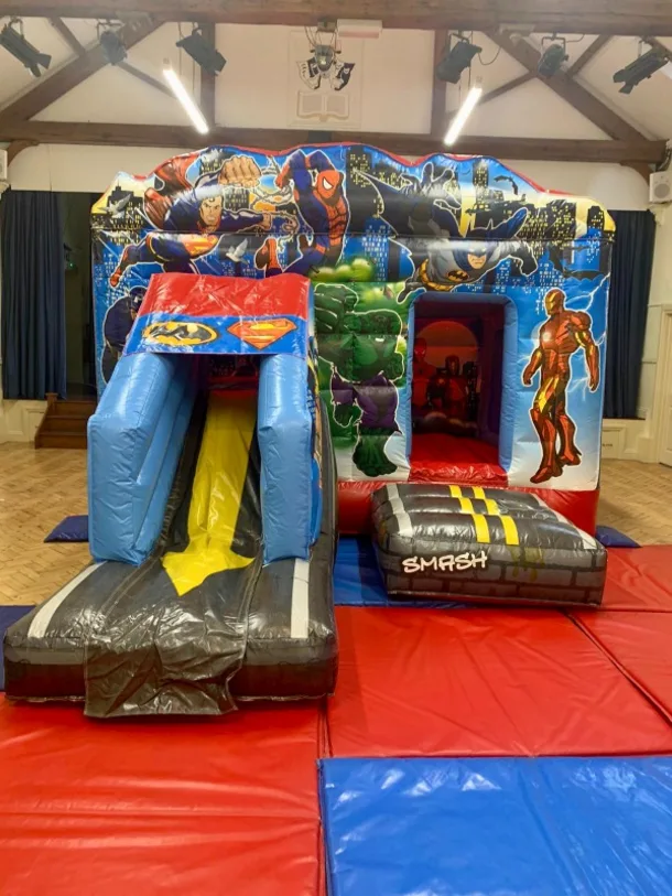 Superhero Themed Bouncy Castle With Front Slide