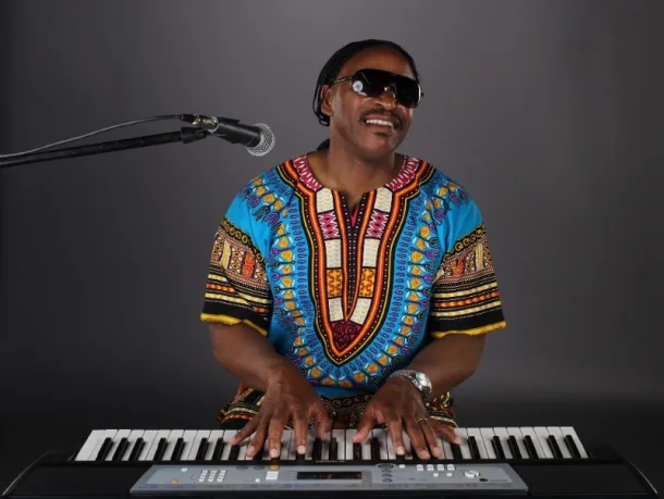 Godfrey Gayle As Stevie Wonder