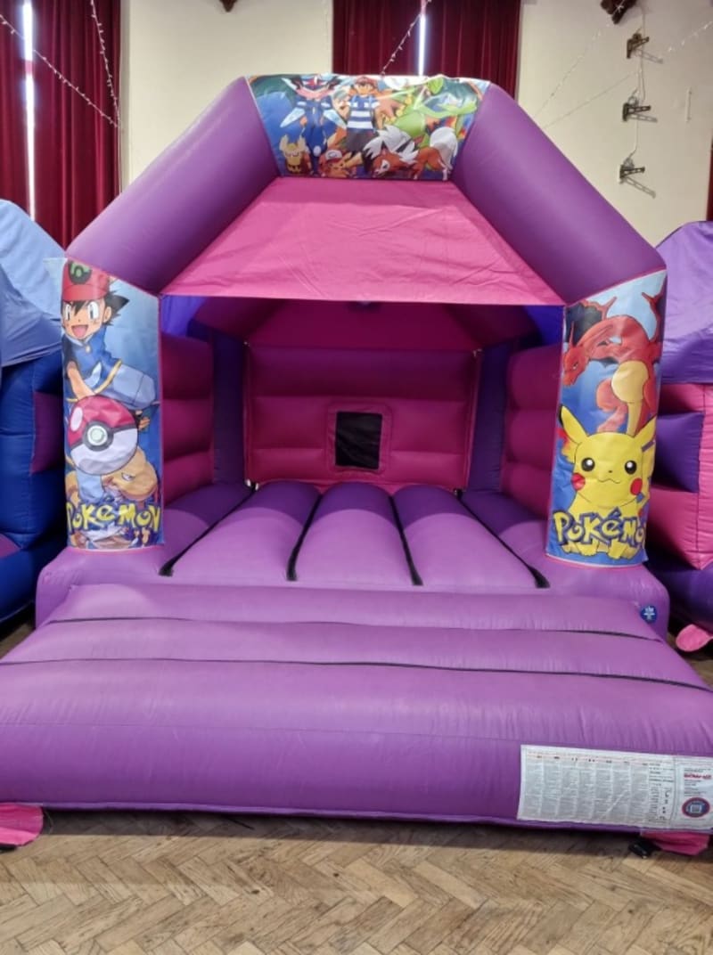 Purple And Pink Pokemon Bouncy Castle Inflatable and Soft Play Hire Redcar