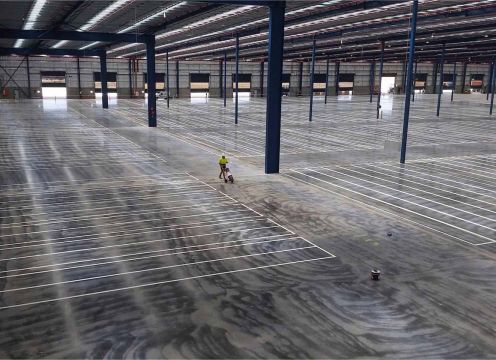 Creating lines in a warehouse where the shelves will be.