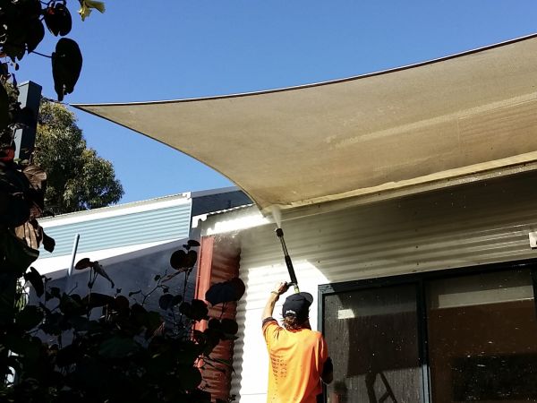 High pressure cleaning on exterior house