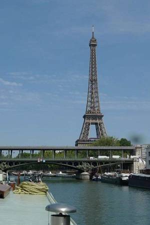 View on Eiffel tower from barge Johanna entering Paris on the Seine