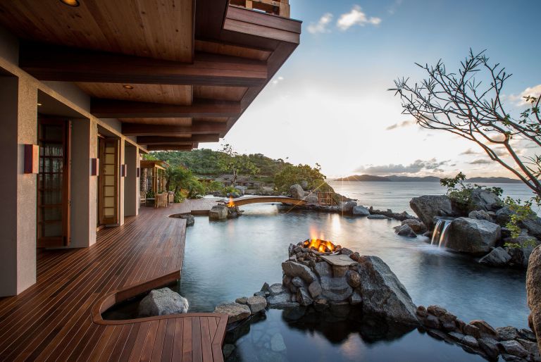 deck with view of water and rocks at British Virgin Island residence