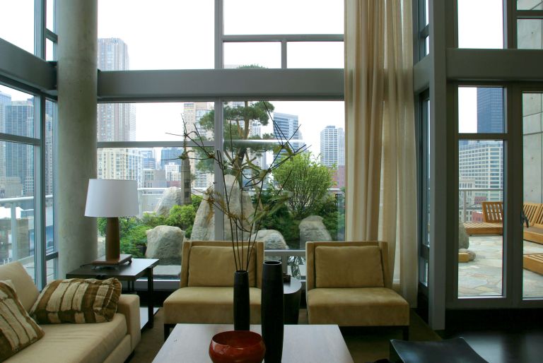 interior penthouse room with views of rooftop garden and Chicago