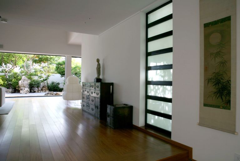 view of garden through doorway from Grand Cayman residence