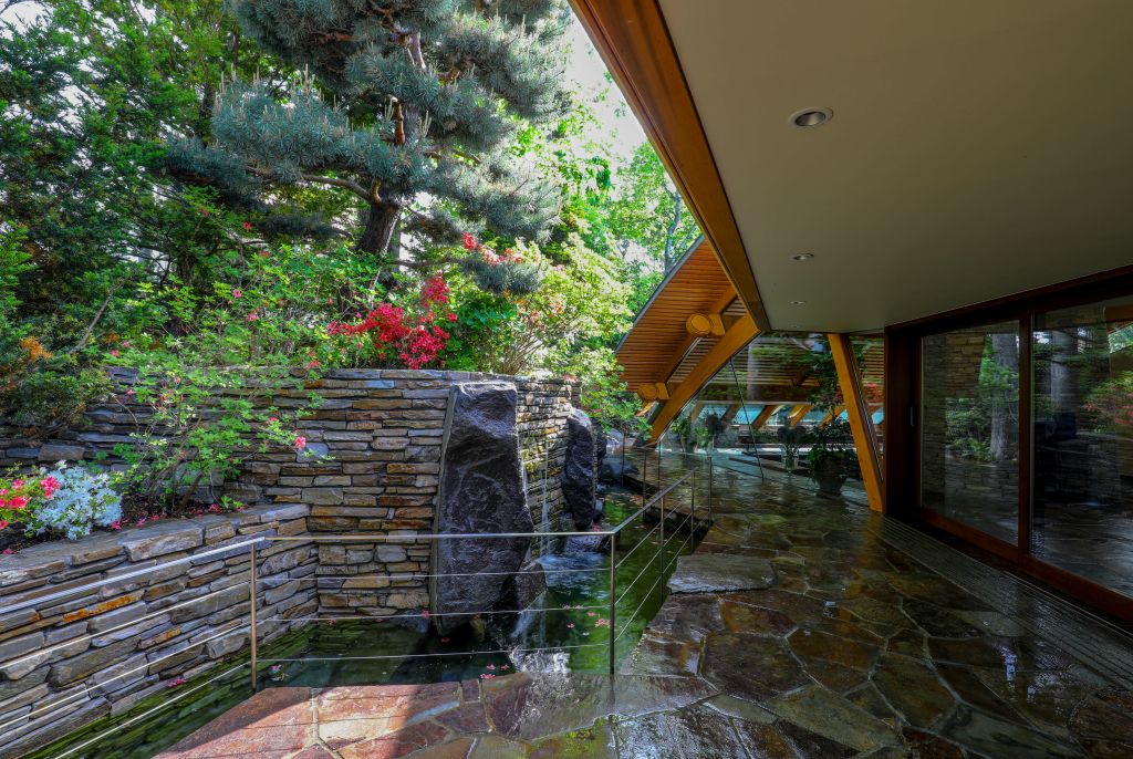 view of trees from pavilion with stream