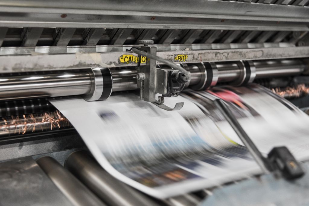 Photo of a printing press in operation