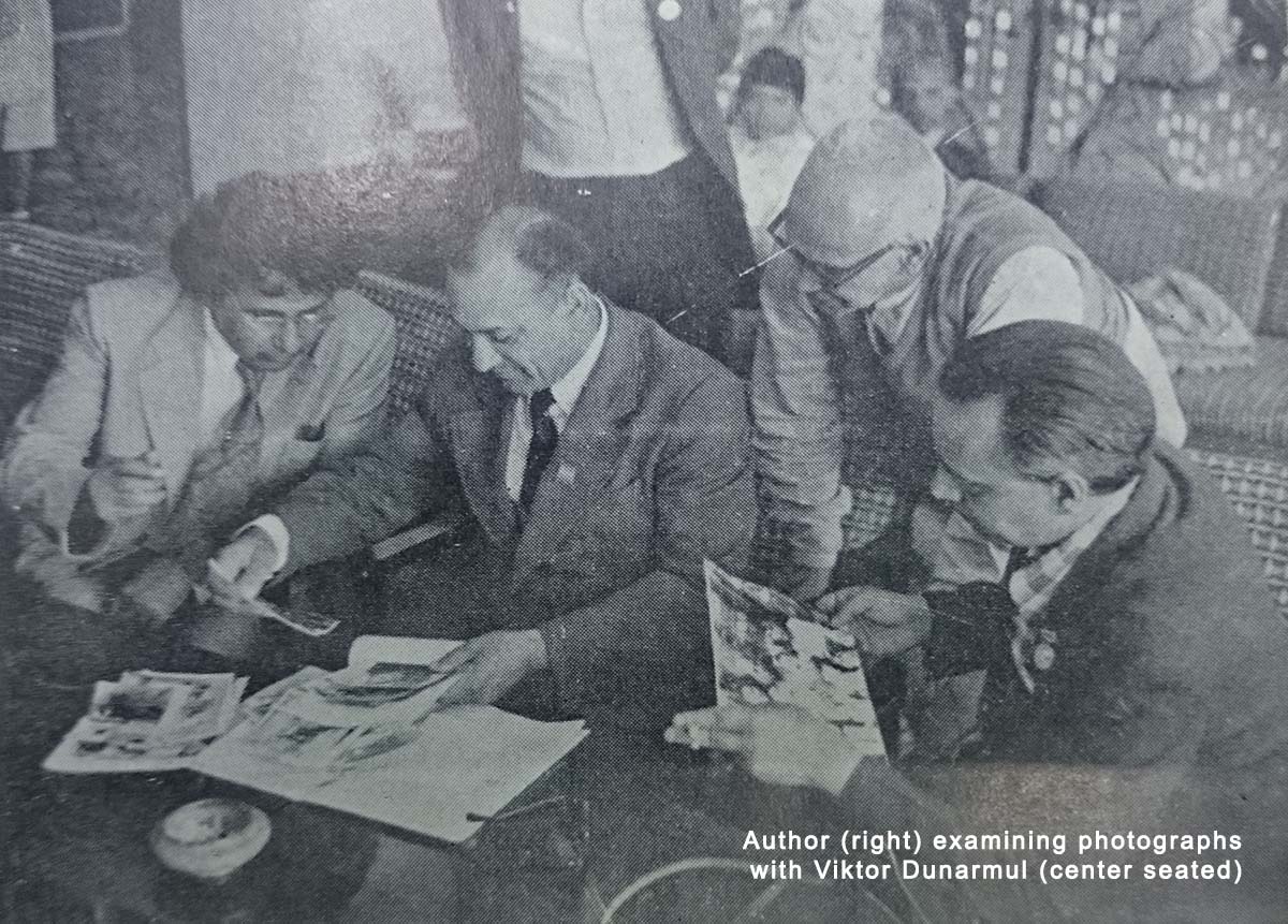 Sadhan Mukherjee examining pictures with Viktor Dunarmul in Samarkand