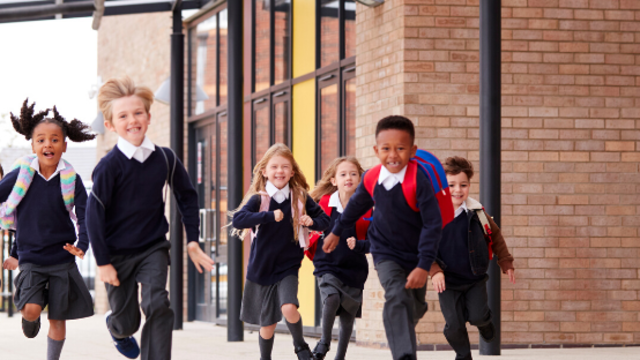 Kids running in school uniform