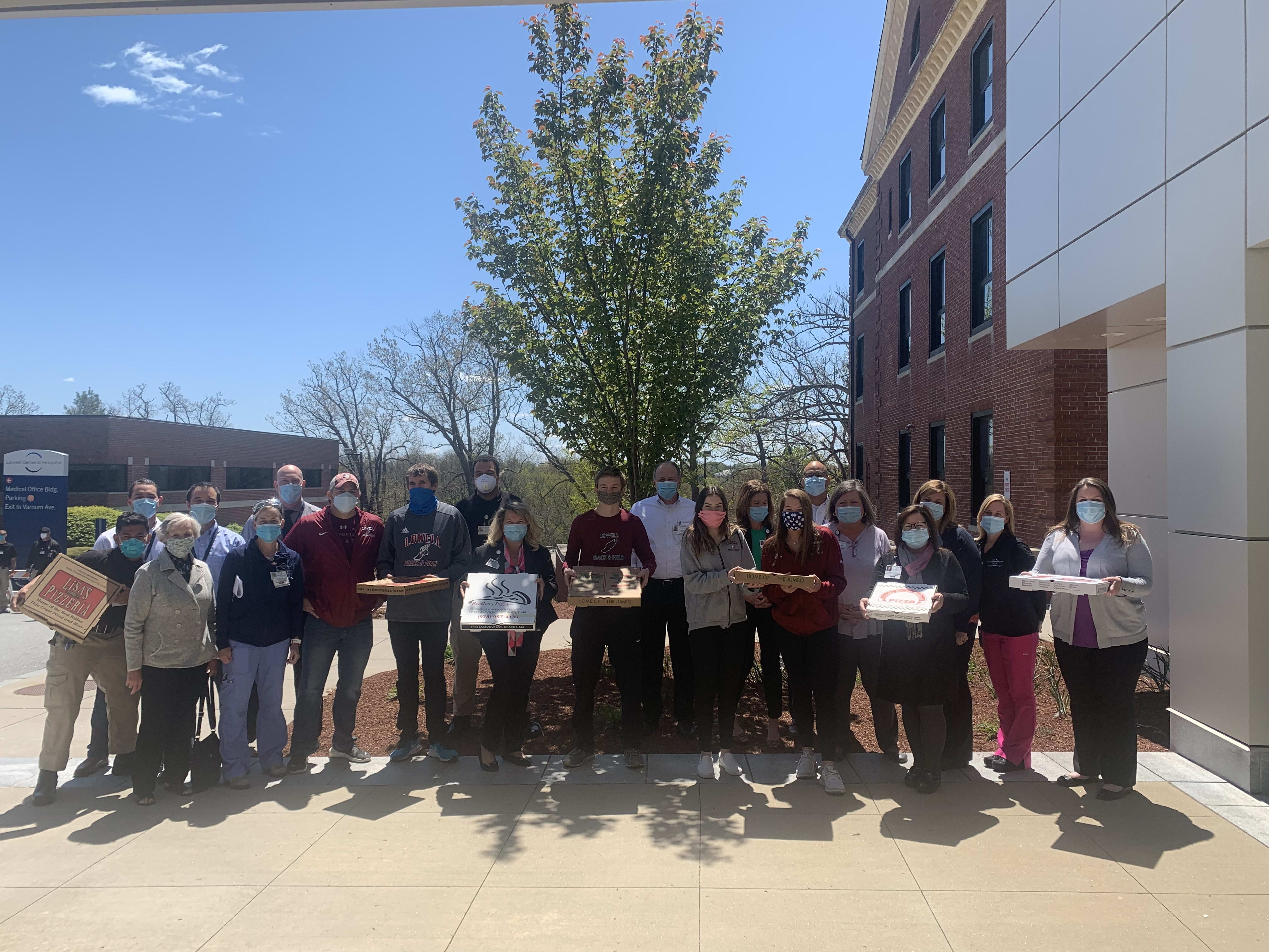 Help Us Heal - Lowell Track and Field Group Photo