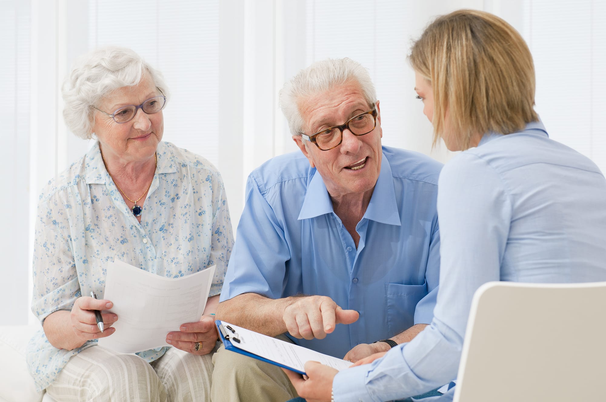 Provider meeting with elderly couple