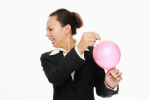 Woman popping balloon with pin, symbolizing post, "The Souffle & The Sledgehammer."