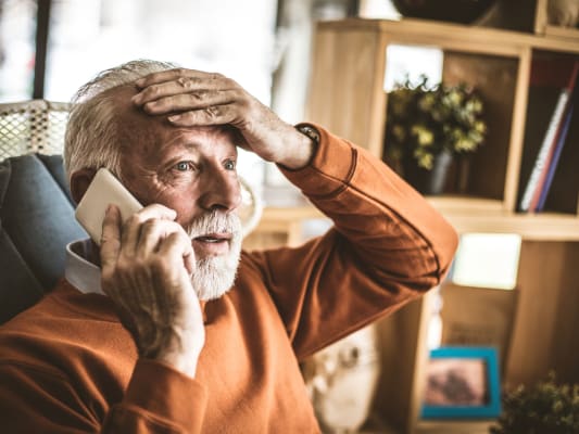 phone scam and senior on phone