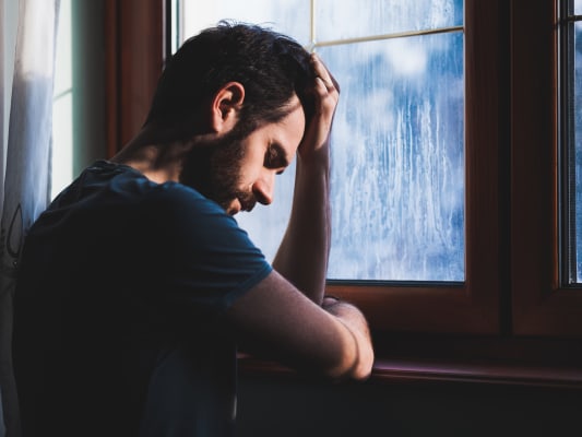 Male reflecting on self
