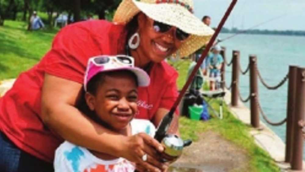 Young girl and mom fishing Young girl and mom fishing