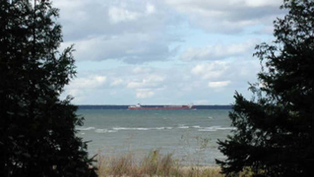 A ship passes by on Lake Huron A ship passes by on Lake Huron