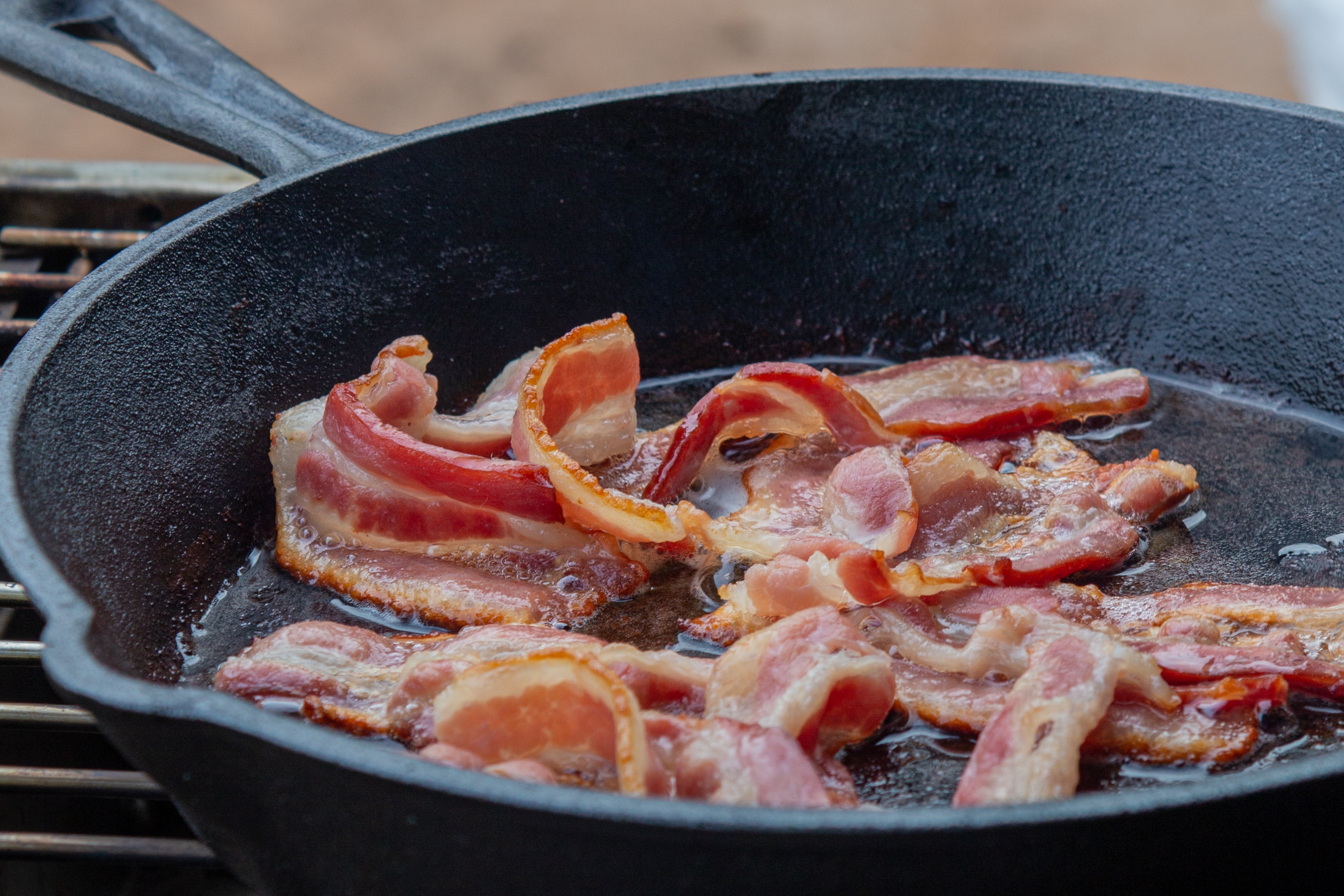 An image of cooking bacon