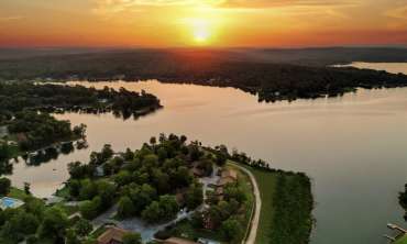 A view of the lake while the sun sets.