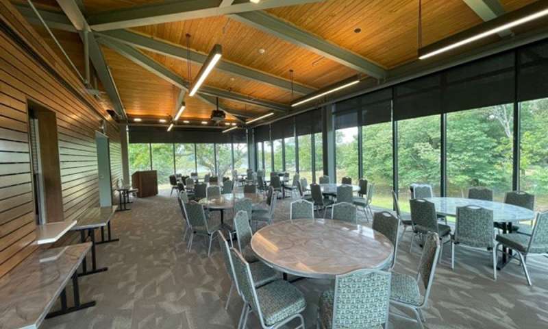 Tables and chairs set up for a reception in the Visitor Center Meeting Room at Jacksonport State Park