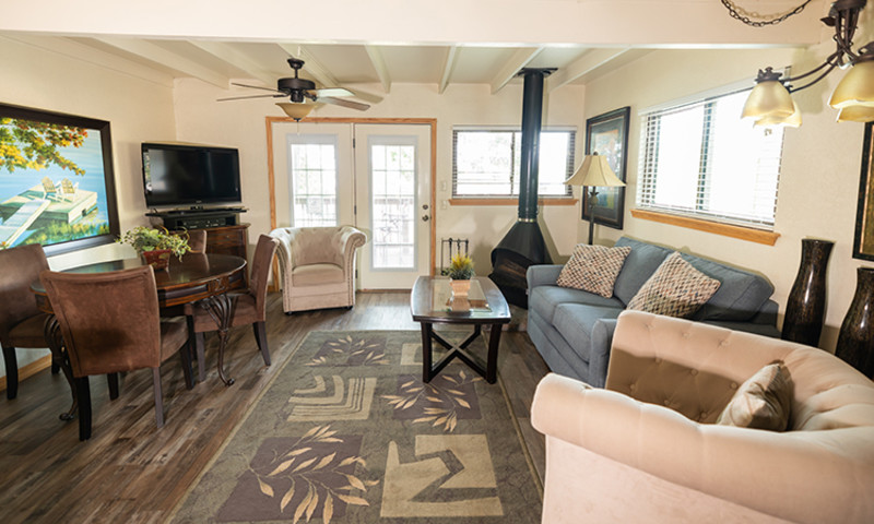 Our cozy, vintage cottage, C1, has the original cone fireplace from the 60's!