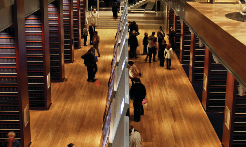 Visitors explore two floors of permanent exhibits inside the Clinton Presidential Center