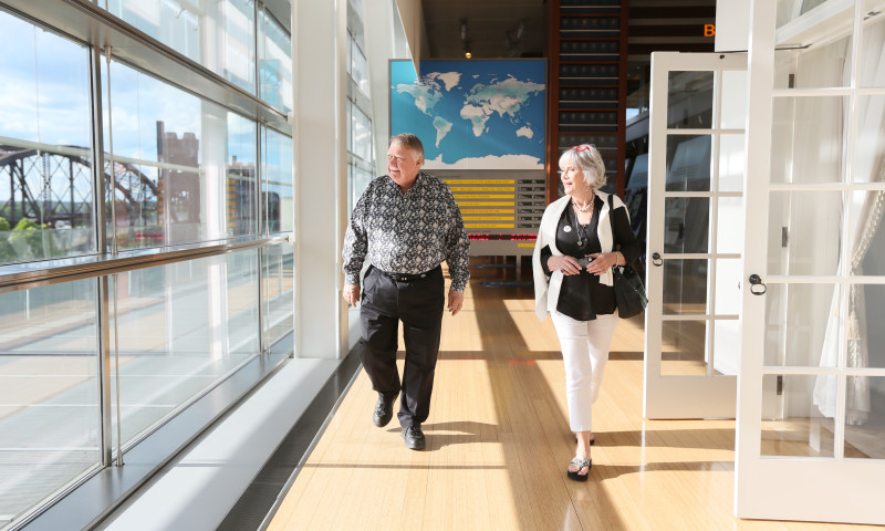 Visitors admire sweeping views of downtown Little Rock from inside the Clinton Presidential Center