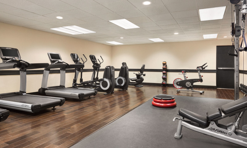 fitness center with cardio equipment