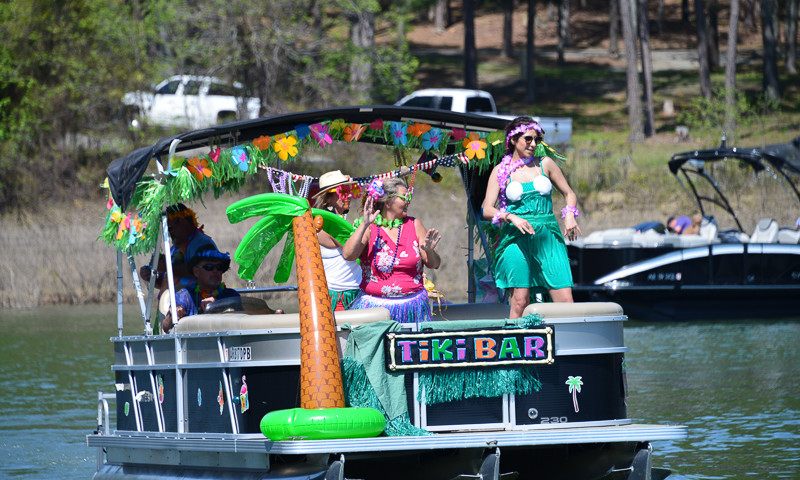 Boati-Gras is Fairfield Bay Marina's annual spring Mardi Gras celebration. People decorate their boats like the Mardis Gras floats. 