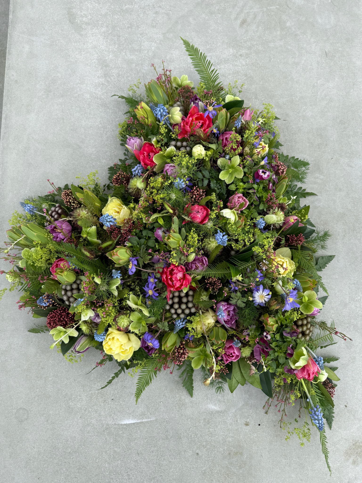 Oasishjerte i årstidens blomster og farver